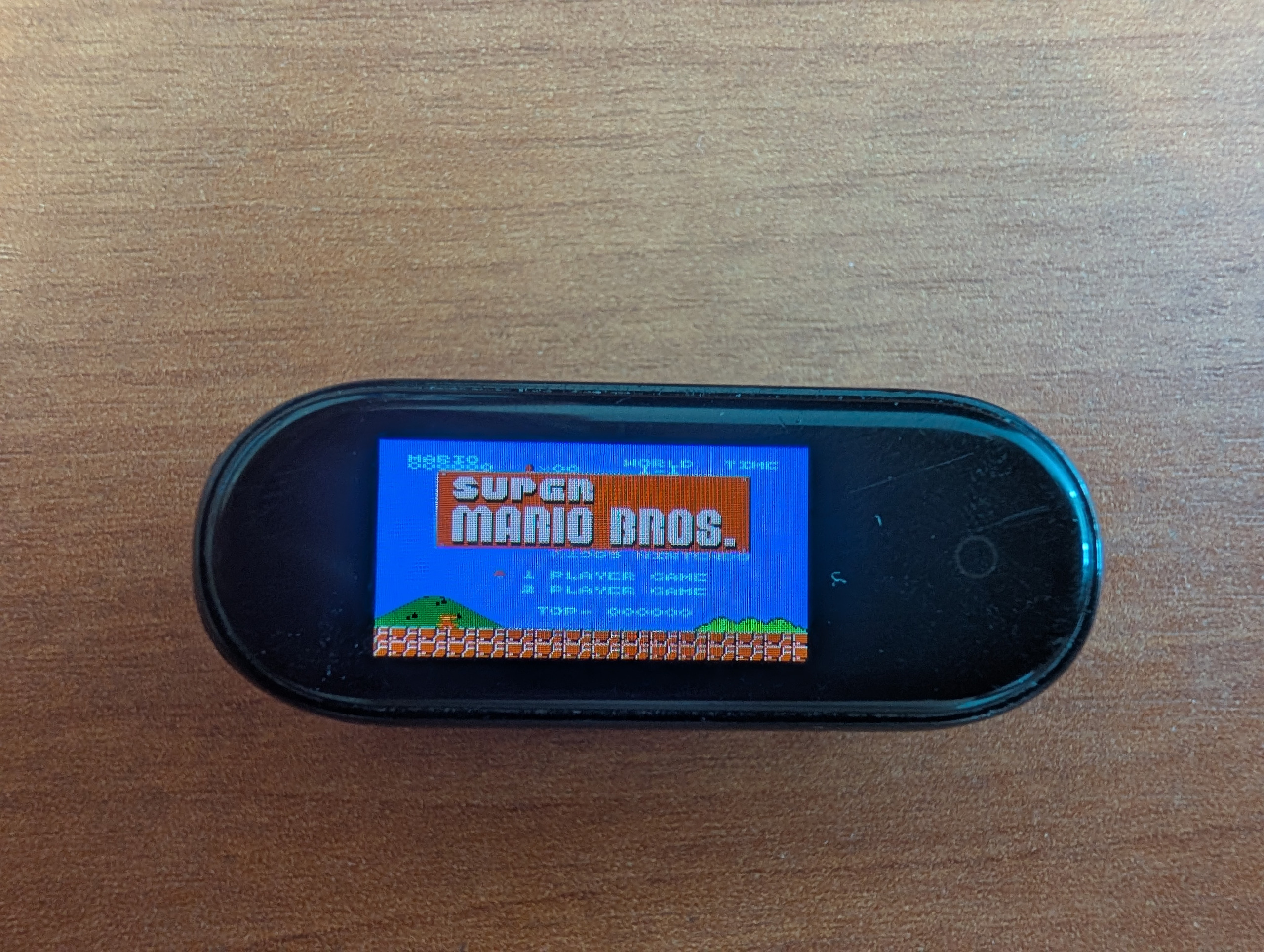Super Mario Bros title screen on the band